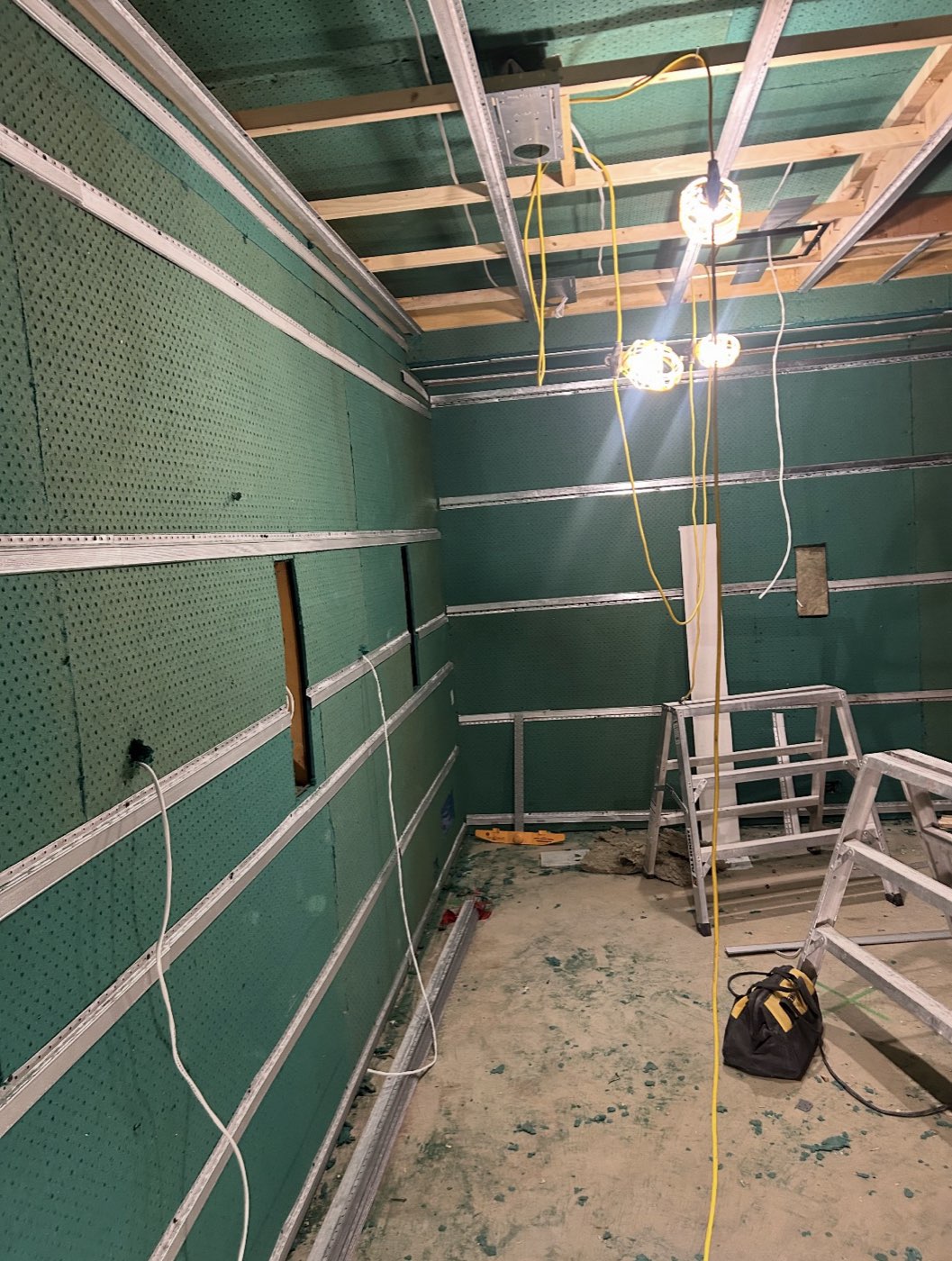 SONOpan sound board and resilient channel installed on a basement wall and ceiling